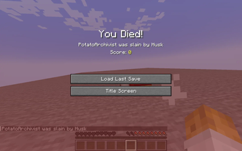The death screen with Load Last Save button