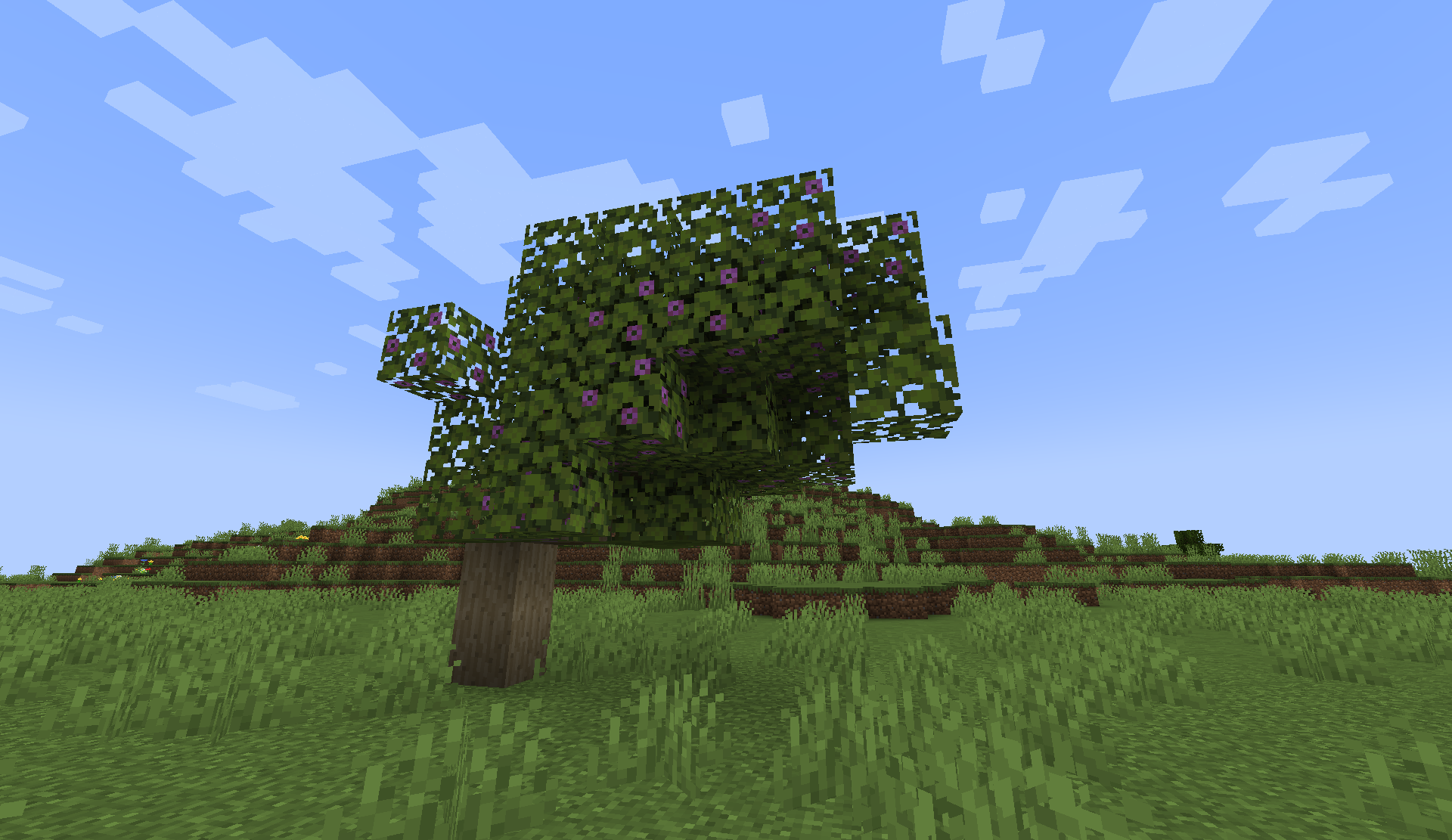An azalea tree with azalea logs for the trunk