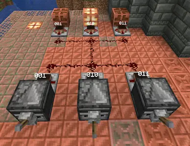 Three Pattern Emitters, linked to three Pattern Detectors by a single Redstone line. The center Detector is powered, and the center Emitter is showing an output.