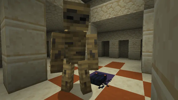Standard Mummy rotting in their crypt, chilling with a scarab